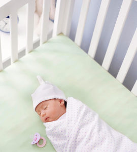 sleeping baby in crib